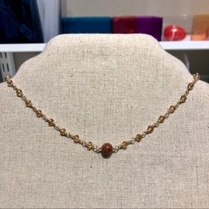 light orange choker necklace w/ goldstone center